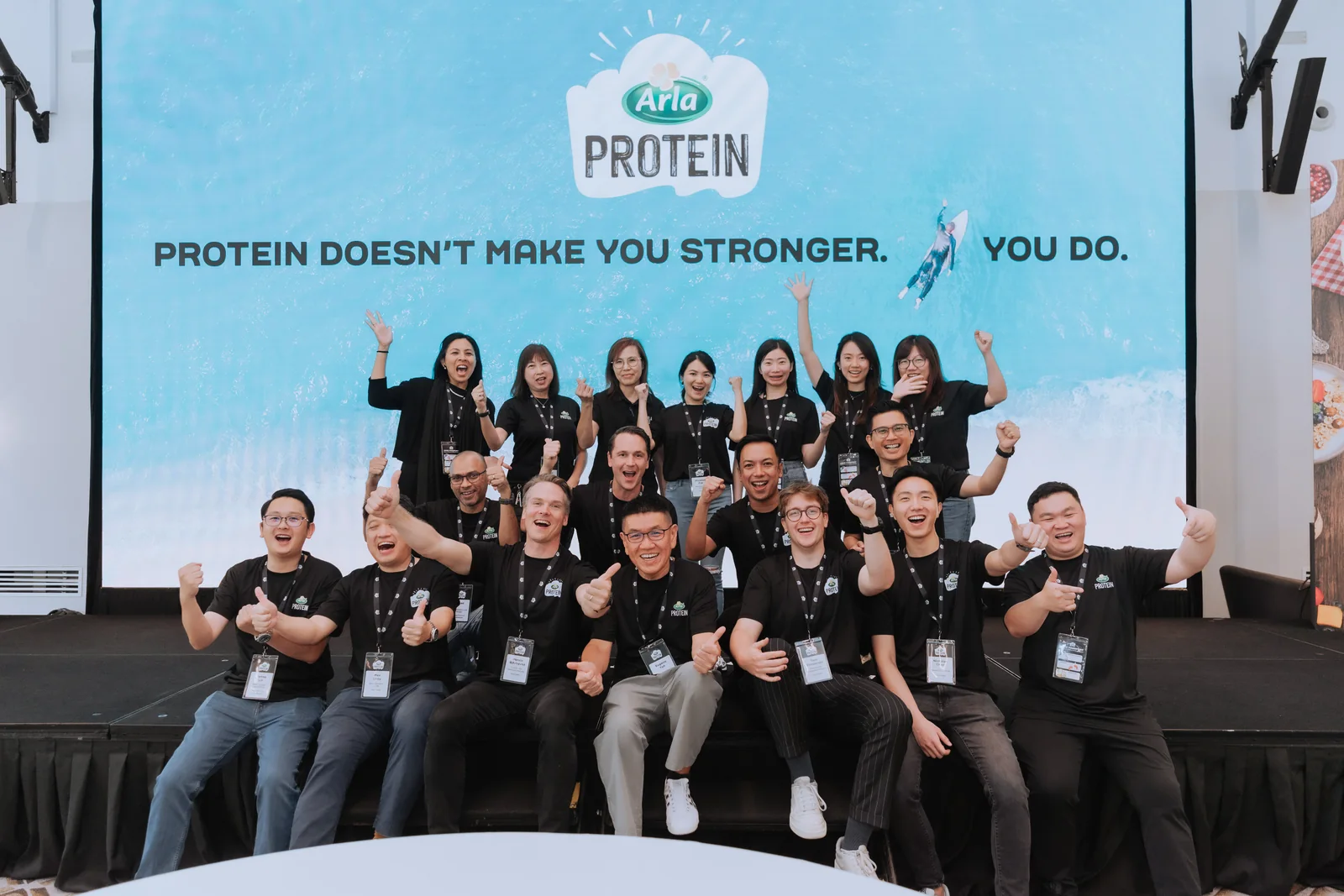 The Arla and Trade-Pro Food Distribution teams on stage at the Arla Protein launch